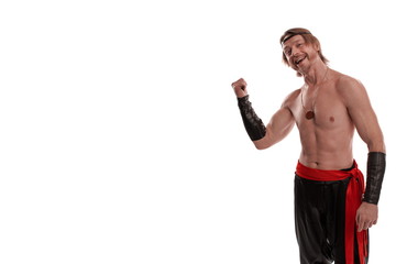 Actor Athlete man in trousers with naked torso posing on a white background in studio
