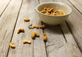 Cashew nuts on a wooden table