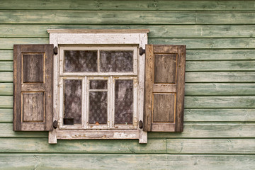 Obraz na płótnie Canvas Old green wooden wall, window shutters opened