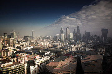 rooftop view over London on a foggy day from St Paul's cathedral, UK