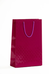 Maroon paper bag on a white background