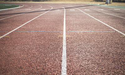 the running track on the stadium. for usage of background, I intentionally defocused