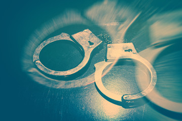 Pair of metal handcuffs