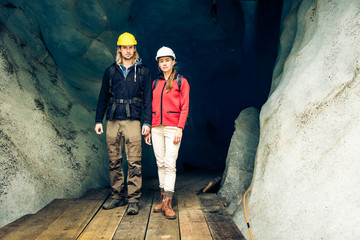 Obraz na płótnie Canvas Team Of Scientists Examining A Glacier