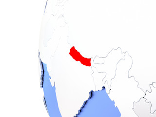 Nepal on metallic globe