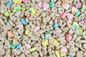 oat cereal background with colorful marshmallows