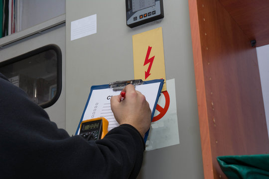 check service for electrical board with check list