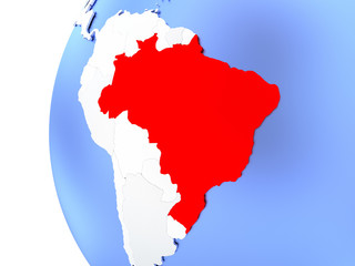 Brazil on metallic globe