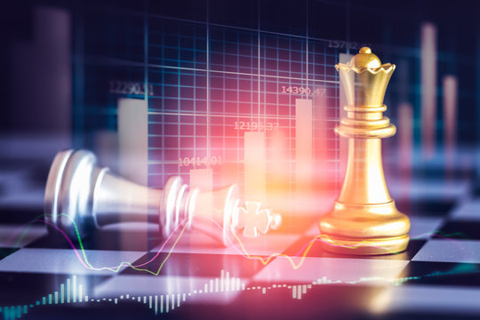 Business game on digital stock market financial and chess background. Digital business and stock market financial on LED. Double exposure chess business strategy and digital stock market financial.
