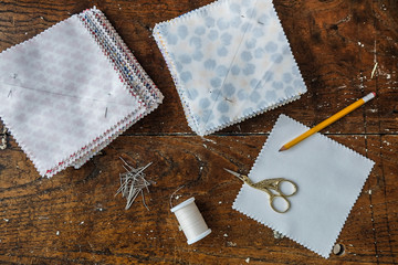 Quilter getting ready to sew with all the supplies ready. 