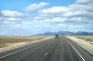 Fototapeta na wymiar Beautiful view of road with mountain view in the spring time. Landscape of state Nevada, USA