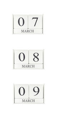 Closeup group of white wooden calendar with black 7 , 8 , 9 march word , three date calendar isolated on white background