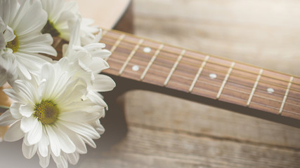 Morning relaxation and cozy with white daisy on guitar for Rural vacation lifestyle , music therapy concept