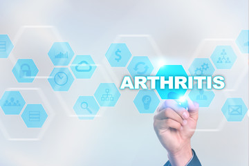 Medical doctor drawing arthritis on the virtual screen.