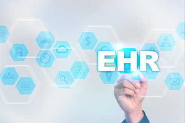 Medical doctor drawing ehr on the virtual screen.