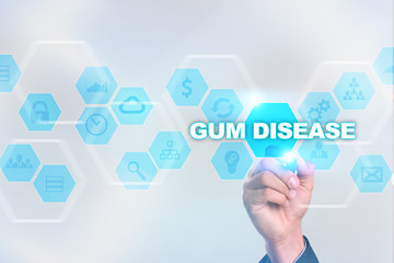 Medical doctor drawing gum disease on the virtual screen.