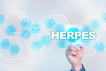 Medical doctor drawing herpes on the virtual screen.