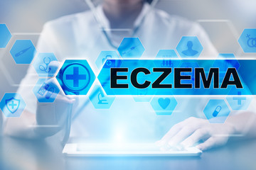 Medical doctor using tablet PC with eczema medical concept.