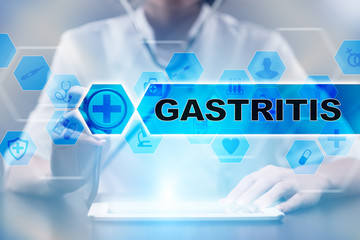 Medical doctor using tablet PC with gastritis medical concept.
