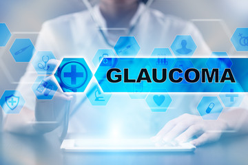 Medical doctor using tablet PC with glaucoma medical concept.