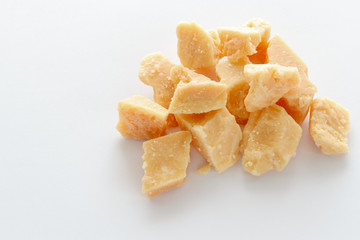 Hard cheese on a white background