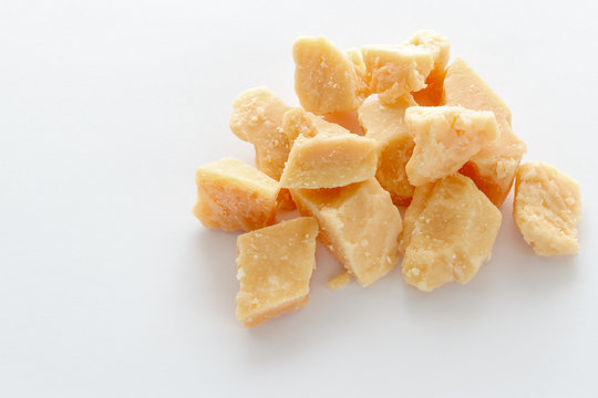 Hard cheese on a white background