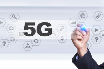 Businessman drawing on virtual screen. 5g concept.