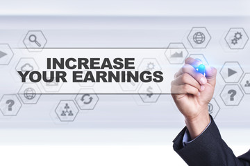 Businessman drawing on virtual screen. increase your earnings concept.
