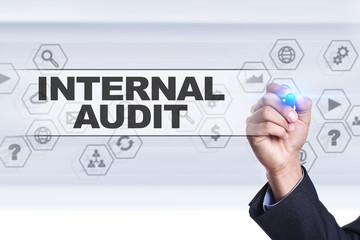 Businessman drawing on virtual screen. internal audit concept.