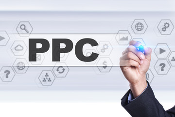 Businessman drawing on virtual screen. ppc concept.