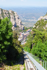 View of the Monastery of Montserrat in Catalonia from the cable car cabin, near Barcelona.