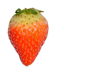 Strawberry cut in half isolated on a white background.