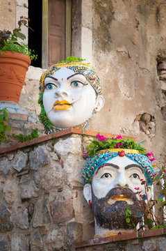 Ornamental plottery planters along the alley of Taormina, Sicily