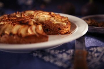 apple pie on a blue tablecloth