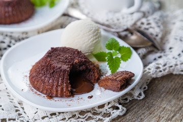 Fototapeta na wymiar Chocolate fondant - lava cake with vanilla ice cream