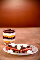 Pancake cake with fresh raspberry, pistachios and dark chocolate