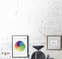 Coffee roaster with photo frames on the wall