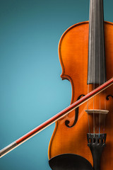 The violin front view on blue