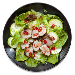 Pork Salad on Black Plate Isolated Top View