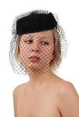 Beautiful girl in black hat with veil