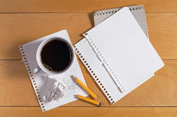 Paper from a notebook with coffee