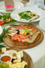 Tasty appetizer. Plate of red fish Salmon fillet.