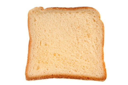 Tranche de pain de mie sur fond blanc
