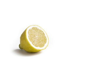 yellow half lemon isolated on white background