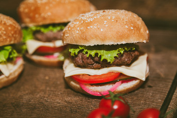 burgers, red peppers and tomatoes