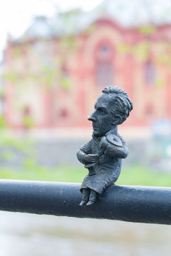Mini sculpture of Bela Bartok on the handrail of the bridge. Uzhgorod, Ukraine