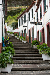 Steep stairs decorated with flowers in Sao Vincente. Madeira. Portugal