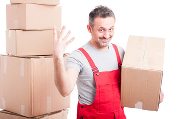 Portrait of mover guy holding box showing four gesture