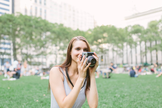 American Girl with Vintage Camera in Bryant Park, Manhattan