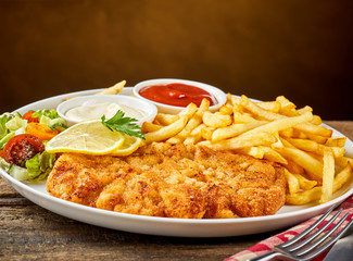 Close-up schnitzel with French fries